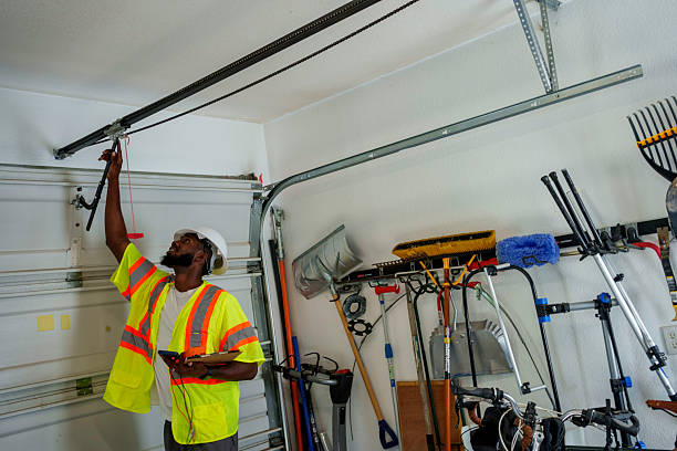 Professional Garage Door Panel Replacement technician working in Jefferson County County, OK